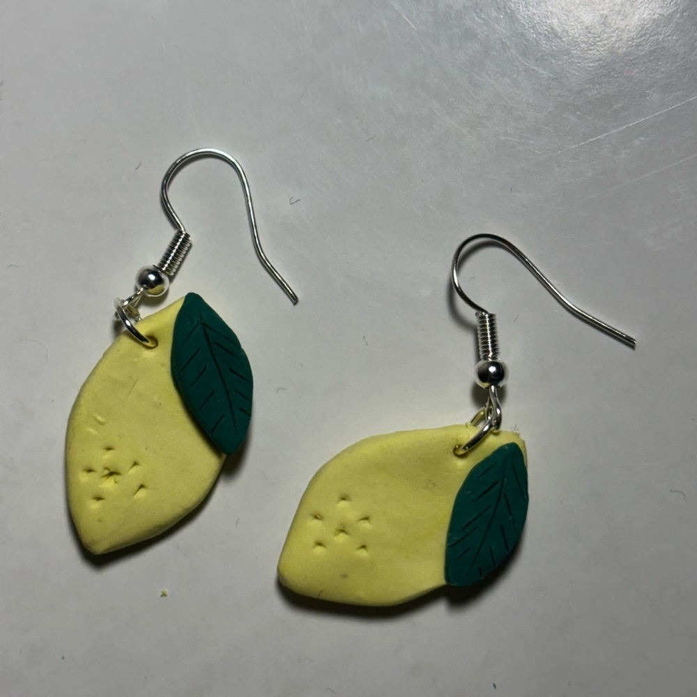 Lemon-Shaped Earrings with Green Leaf Accents
